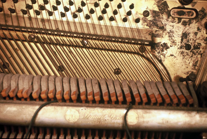 Detail of Al Neil's piano from 'What is a Piano' a performance at the Western Front, photo Carole Itter