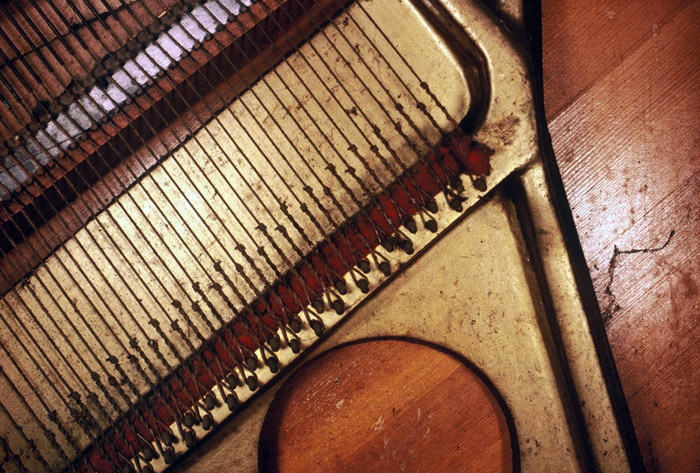 Detail of Al Neil's piano from 'What is a Piano' a performance at the Western Front, photo Carole Itter